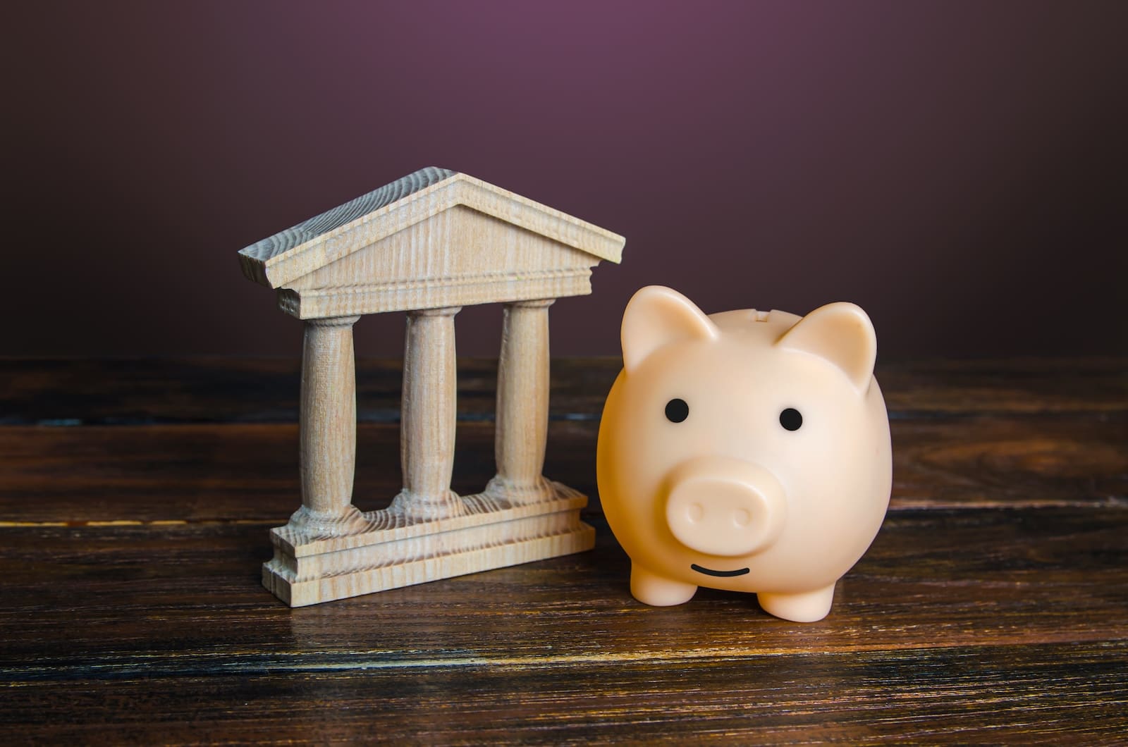 piggy bank near the state building savings deposi 2026 03 24 03 19 59 utc